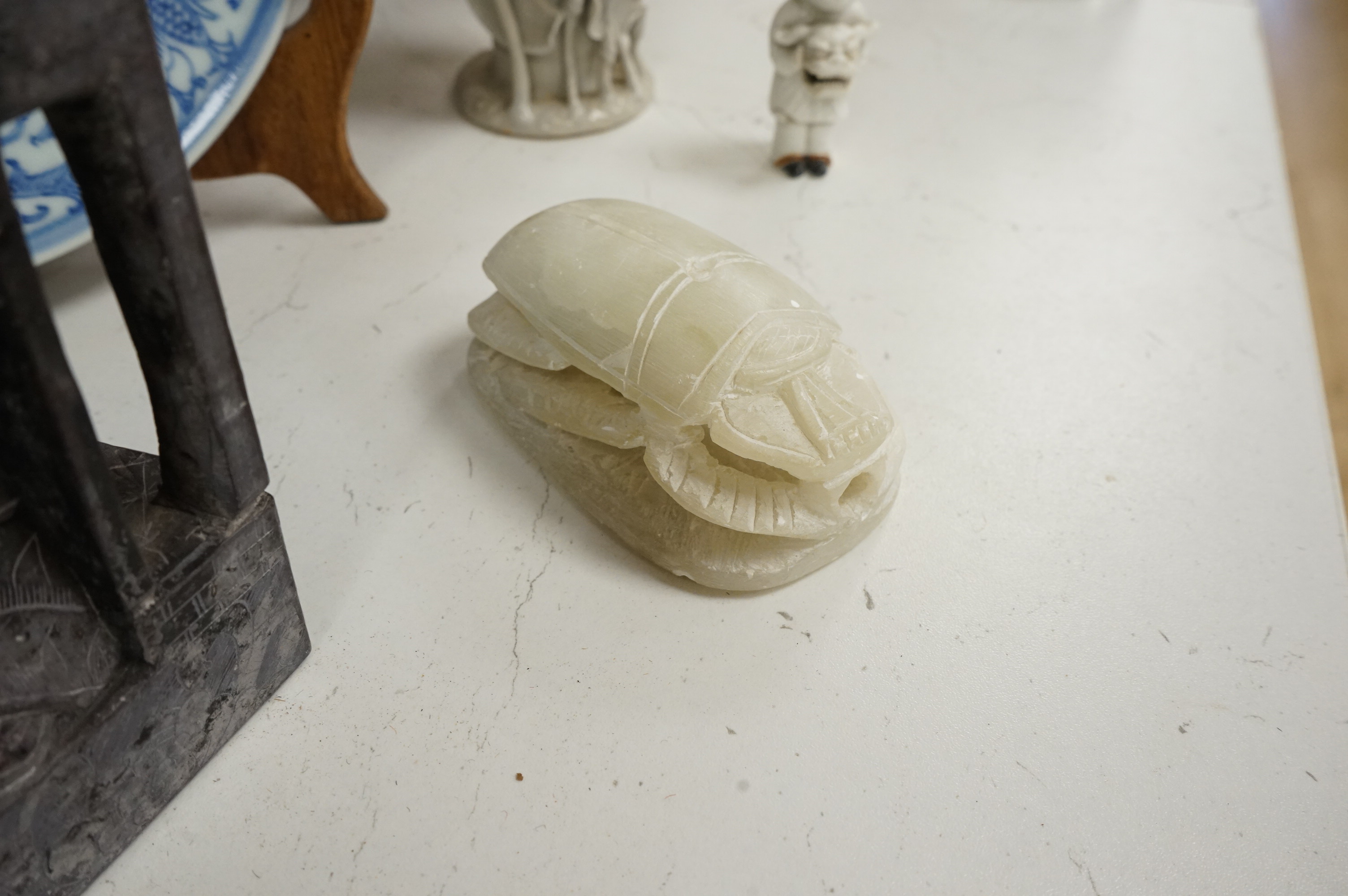 A large collection of various Chinese and Japanese ceramics and collectables to include a 19th century white glazed porcelain figure of Guanyin, largest 30.5cm